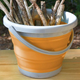 This flexible bucket can hold dirty clothes, dishes, water, firewood, or anything else, but since it collapses down to a flat disc, it won’t take up much precious backpack room.
